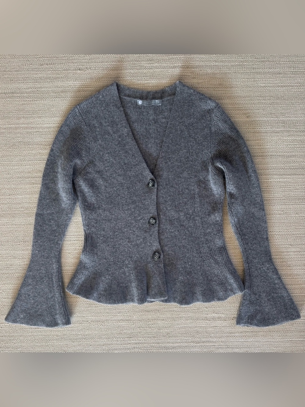 In Cashmere grey knit long bell sleeve peplum cardigan sweater women’s size M